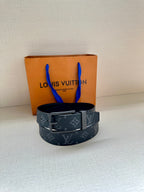Louis Vuitton monogram belt, dark blue strap with metal buckle and keeper