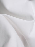 White T-shirt fabric close-up with soft knit texture