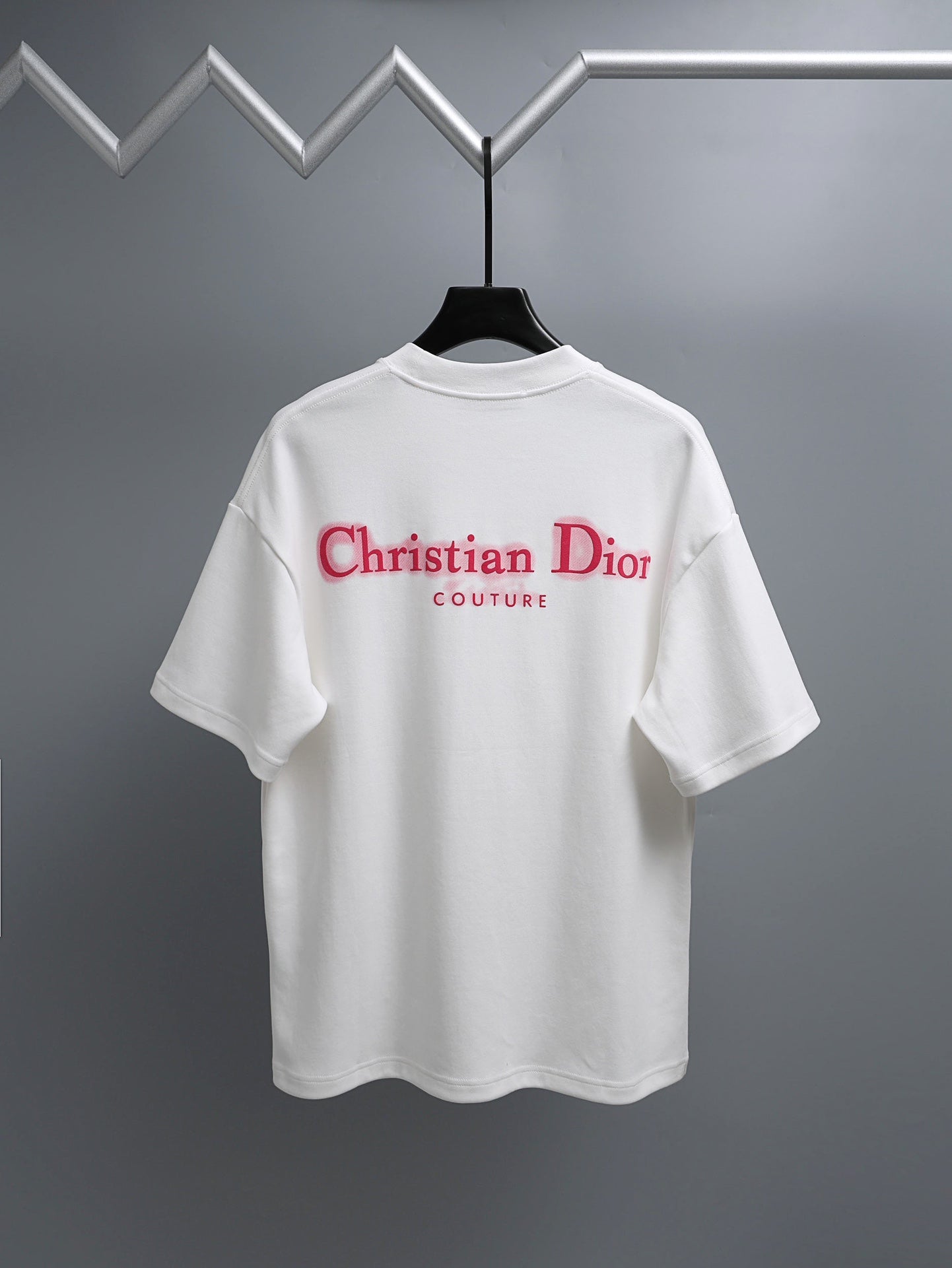 White short-sleeve T-shirt with Christian Dior Couture logo on chest