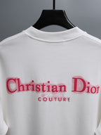 White T-shirt with large red Christian Dior Couture logo across back