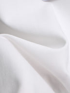 White T-shirt fabric close-up with smooth knit surface