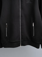Black zip-up hoodie with center silver zipper and two side zipper details