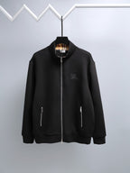 Black zip-up hoodie with raised collar and silver front zipper