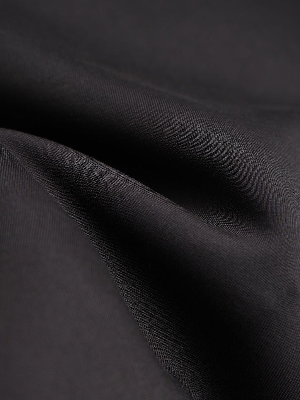 Black hoodie fabric with fine woven texture