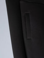 Black jacket with rectangular patch pocket and stitched trim