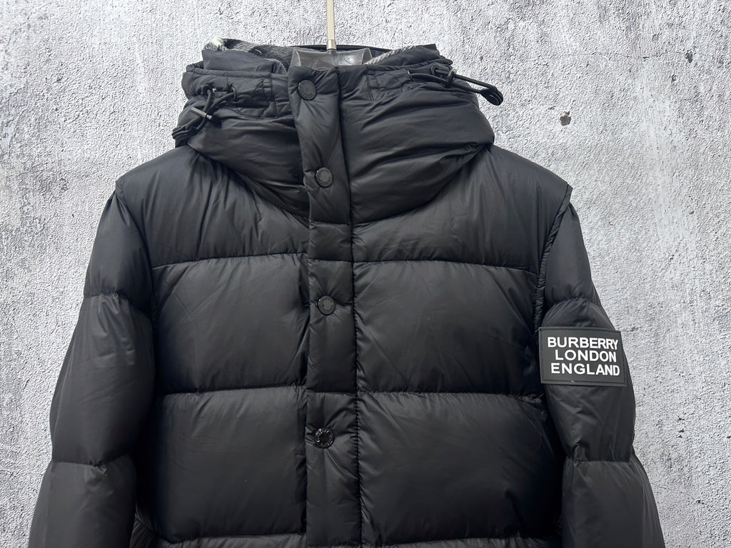 Long quilted puffer jacket with hood, front buttons, and Burberry London England patch