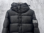 Long quilted puffer jacket with hood, front buttons, and Burberry London England patch