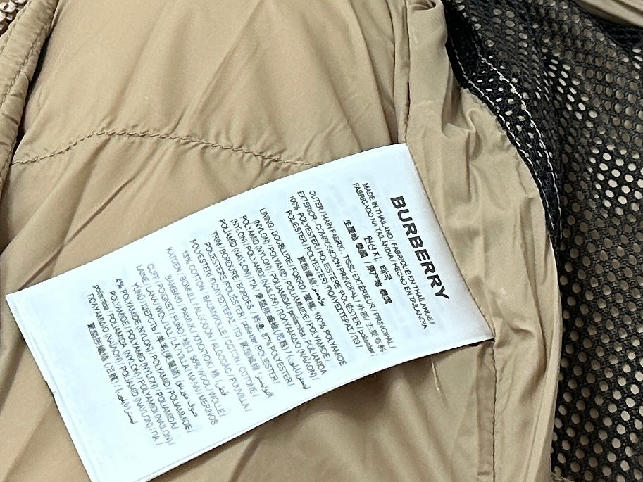 Burberry care label on beige hooded puffer jacket lining