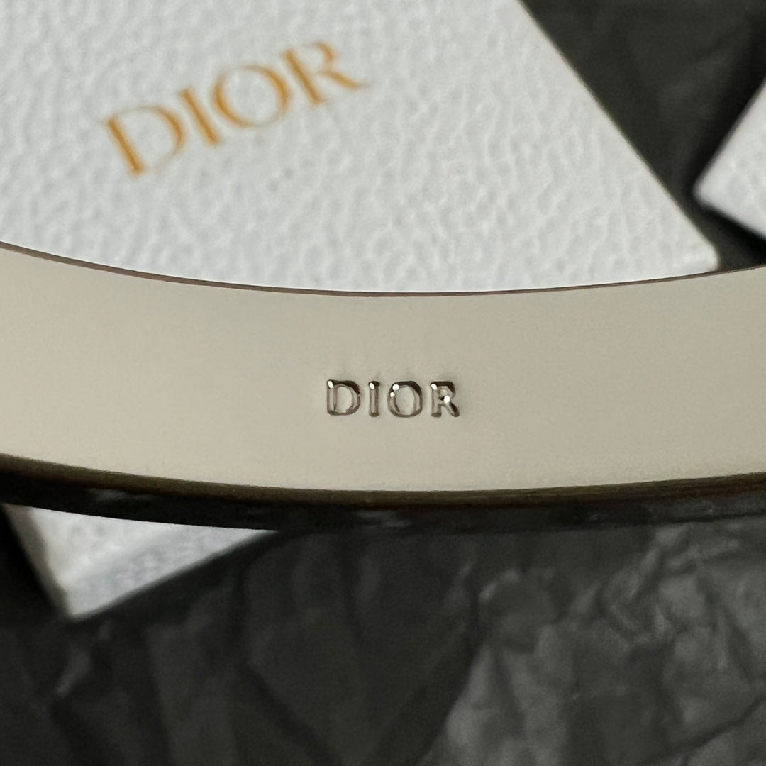 Dior cuff bracelet interior engraving with DIOR text