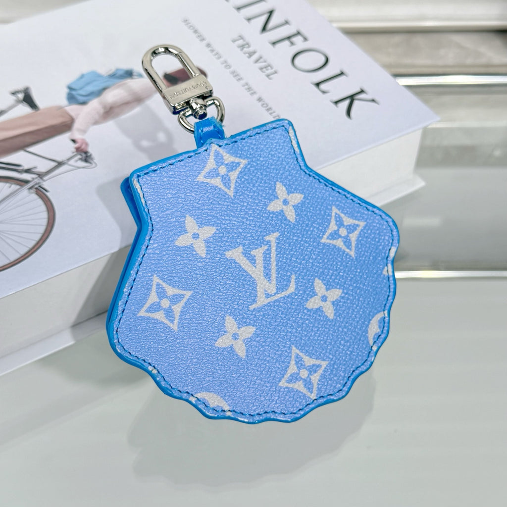 Louis Vuitton monogram key pouch front, blue with white pattern and key ring