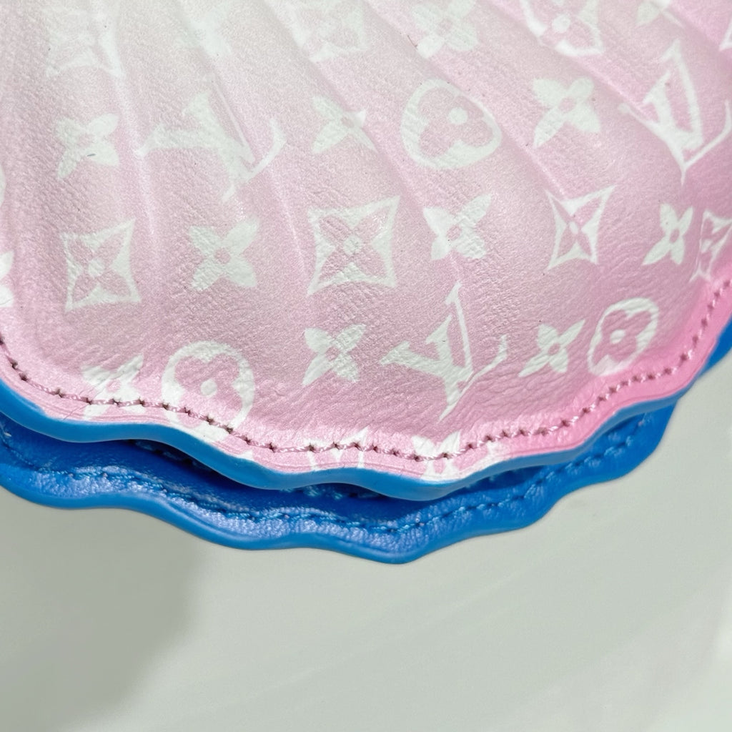 Louis Vuitton shell bag bottom edge, pink monogram fabric with blue textured trim