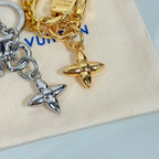 Charm keychain with gold and silver heart and star pendants on chain