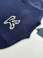 Louis Vuitton knit sweater sleeve with small white LV logo on dark blue