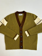 Green knit cardigan close-up with brown V-neck and contrast striped cuffs