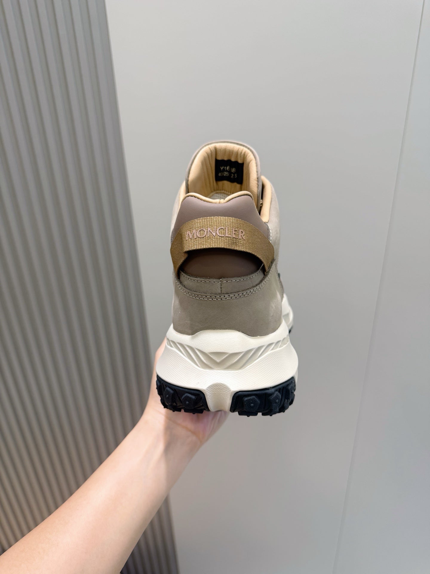 Moncler sneakers heel with embossed logo on beige upper and white sole