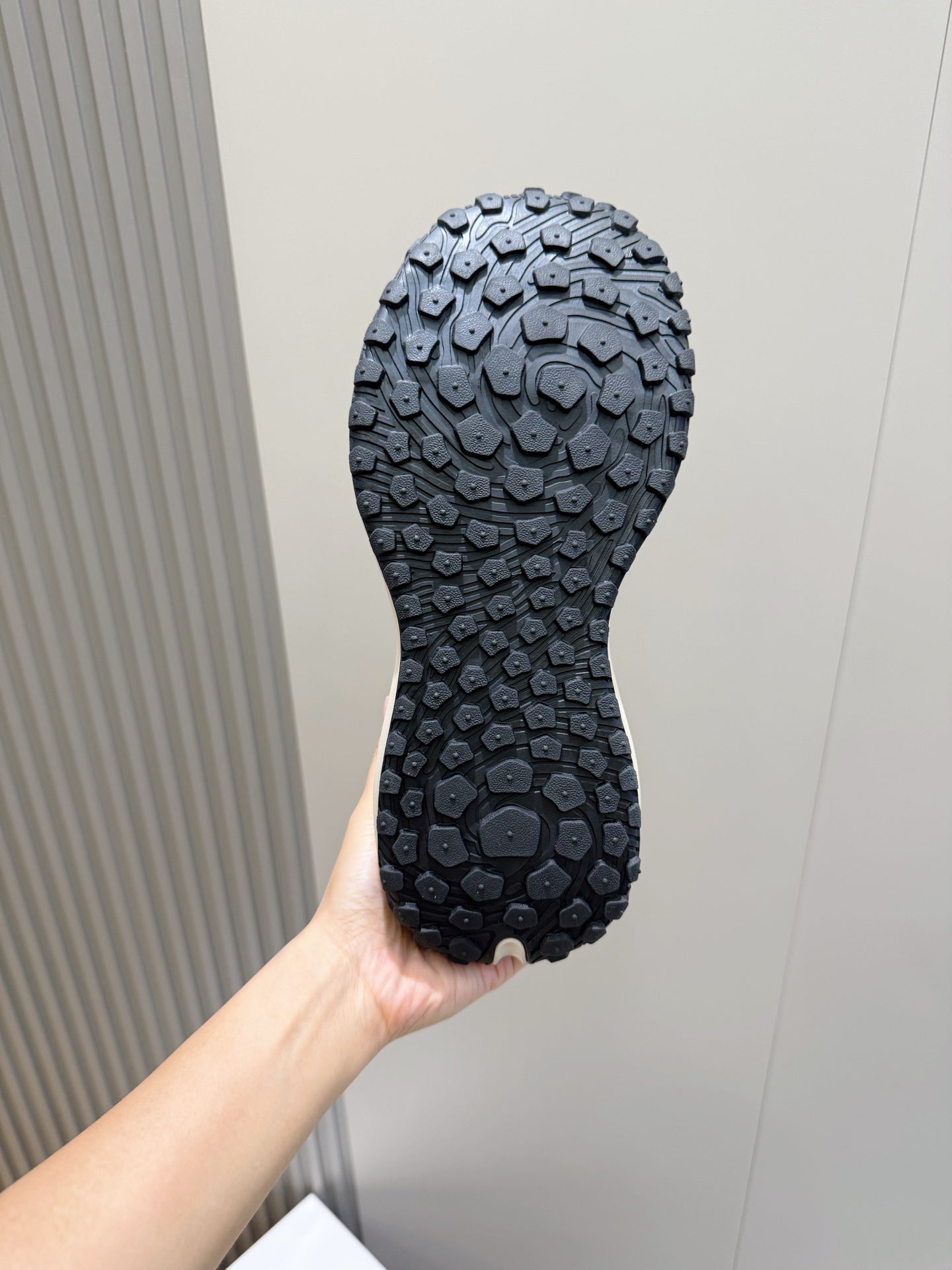 Moncler sneakers outsole, dark rubber tread with multi-nub traction pattern