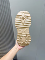 Moncler sneaker outsole, beige tread with circular and V-shaped patterns