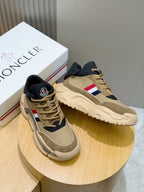 Moncler beige/navy sneakers pair on round stand, rope laces and tricolor stripe