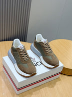 Men’s Moncler low-top sneakers in olive and tan suede with white rubber sole