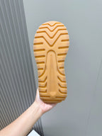 Moncler sneaker outsole underside in light tan rubber with tread pattern