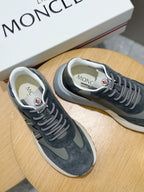 Dark blue suede lace-up sneakers with Moncler logo on the tongue and lace-up front