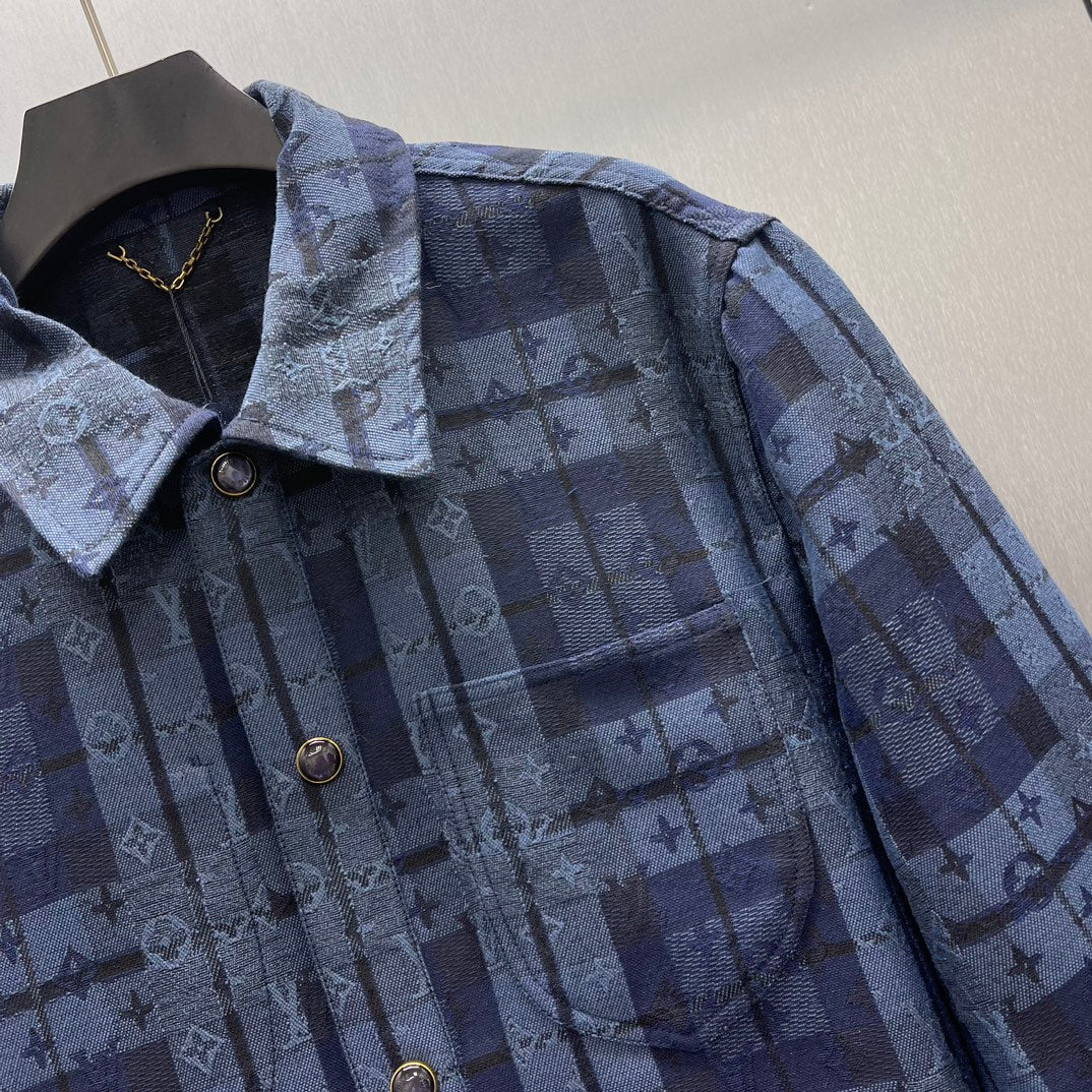 Blue patterned shirt jacket with chest pocket, front buttons, and point collar