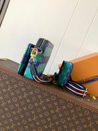 Louis Vuitton men’s crossbody bag with striped strap and side view of zippers