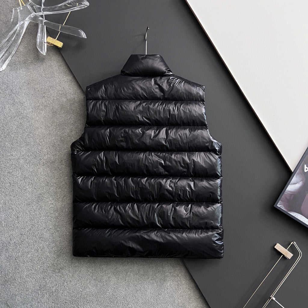 Long black puffer jacket back with quilted horizontal stitching