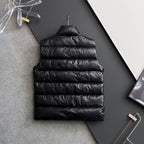 Long black puffer jacket back with quilted horizontal stitching