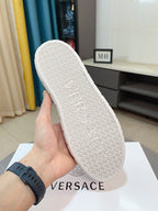 White Versace sneaker outsole with repeating Greek-key pattern