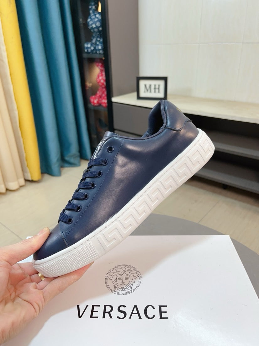 Versace sneakers in dark navy with lace-up upper and chunky white sole edge