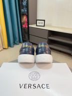 Versace sneakers heel view in dark navy with white rubber back sole