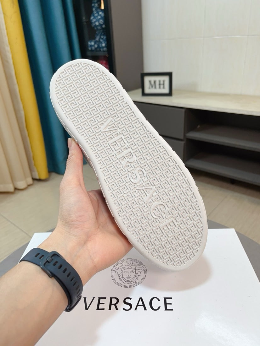 Versace sneakers sole underside in white with repeating pattern tread