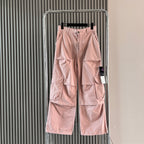 Stone Island cargo shorts in light pink with cargo pockets and belt loops