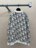 Long-sleeve knit sweater with crew neck and allover logo-like pattern in light gray