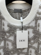 Ribbed crew-neck sweater with light gray and white logo-like jacquard pattern; Dior tag
