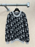 Long-sleeve knit sweater with black and white monogram pattern