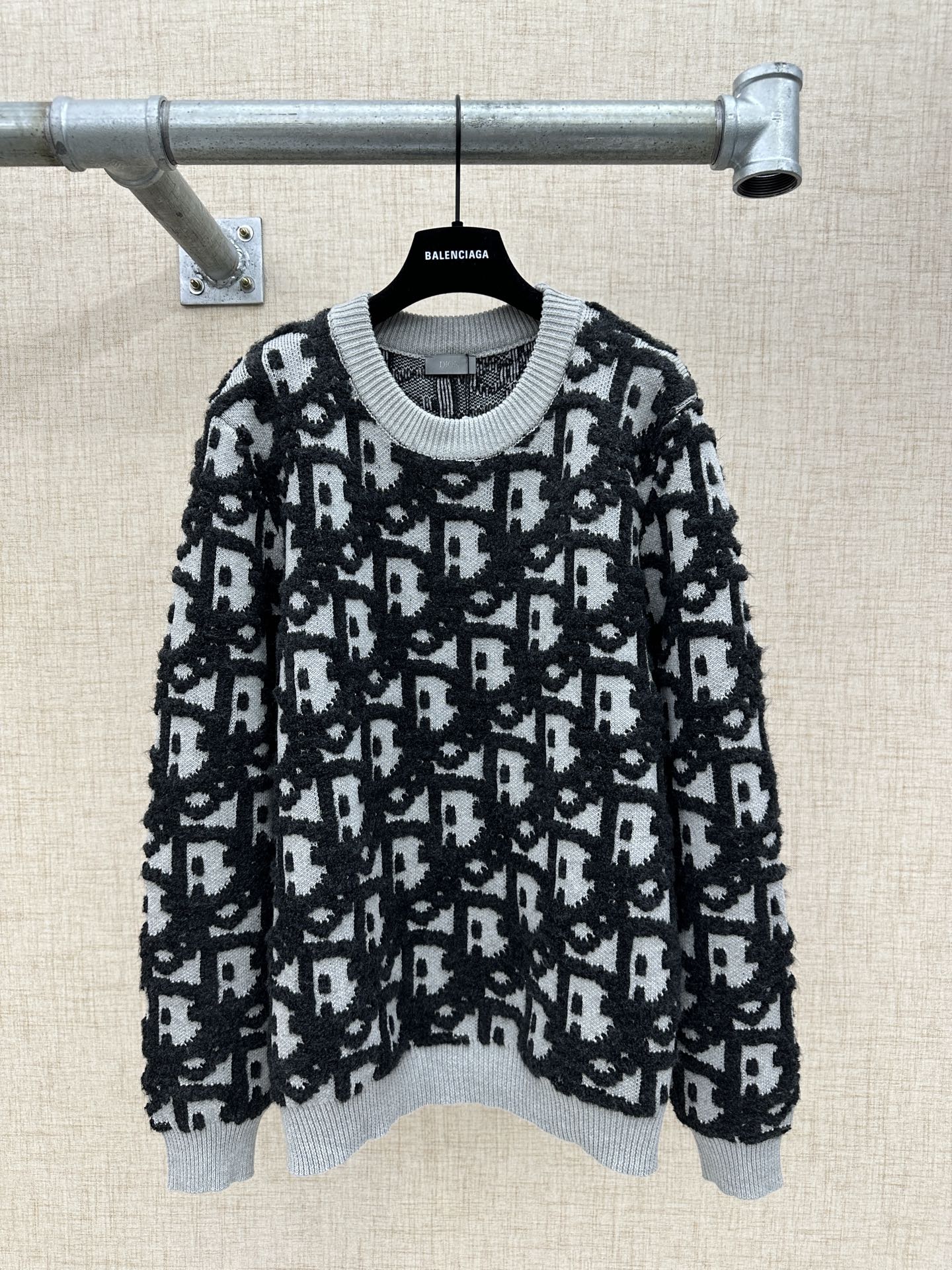 Long-sleeve knit sweater with black and white monogram pattern