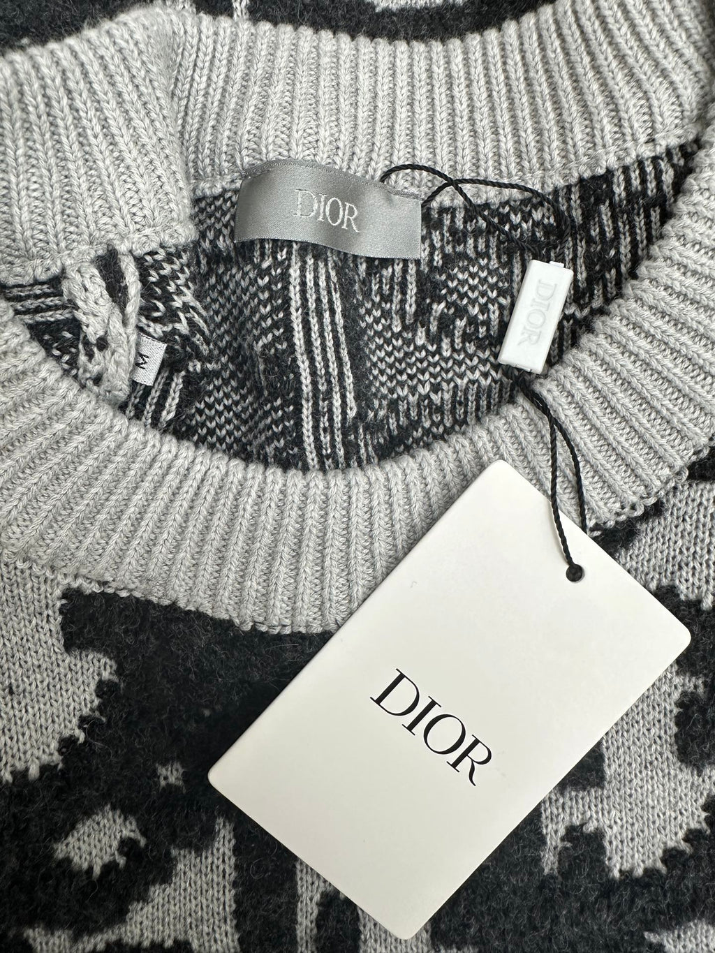 Ribbed crewneck knit sweater with Dior label and tied inner tag