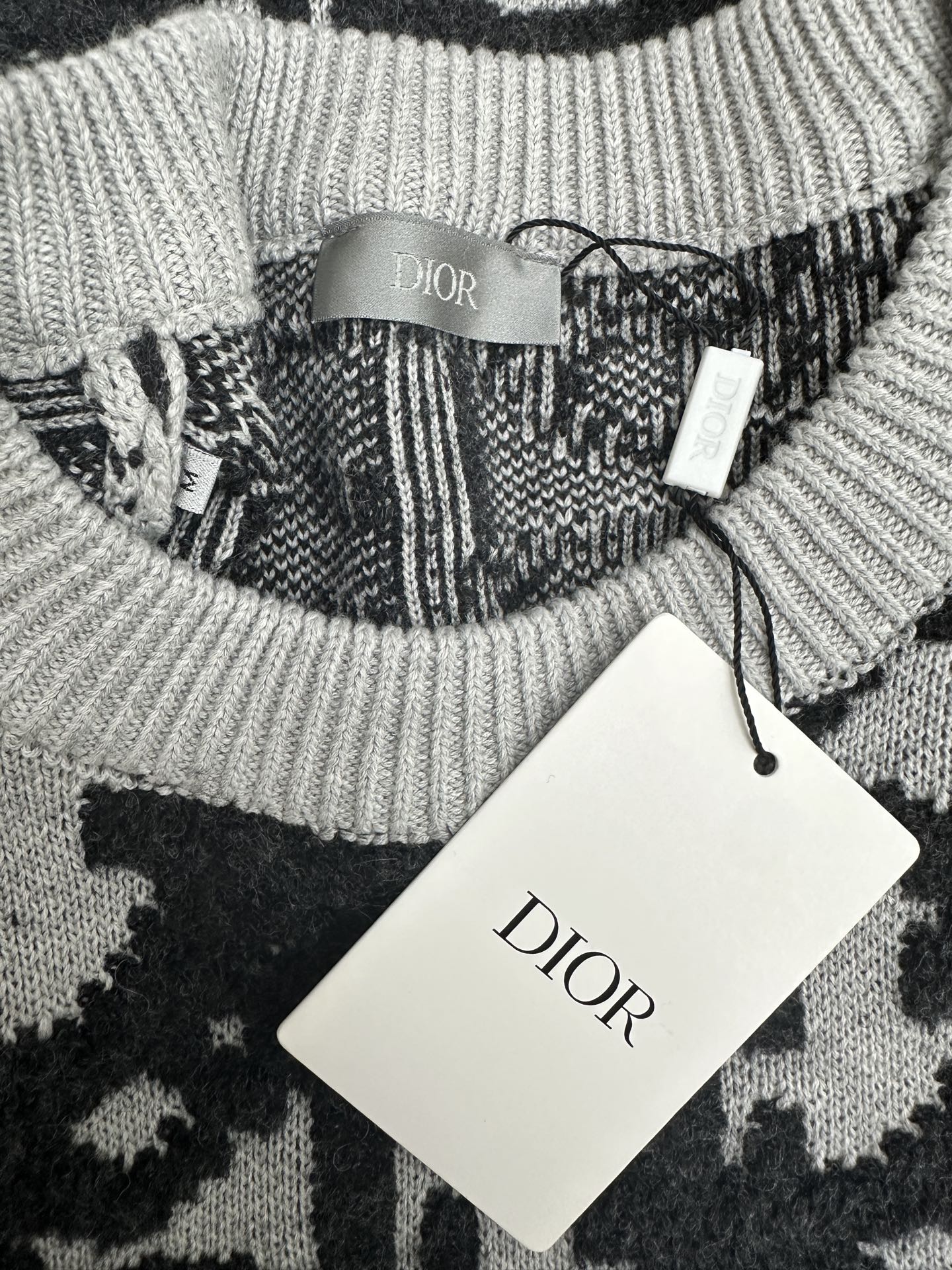 Ribbed crewneck knit sweater with Dior label and tied inner tag