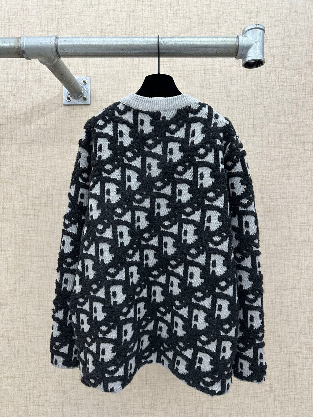 Back view of jacquard knit cardigan with Dior logo pattern, full zip, dark and white