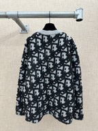 Back view of jacquard knit cardigan with Dior logo pattern, full zip, dark and white