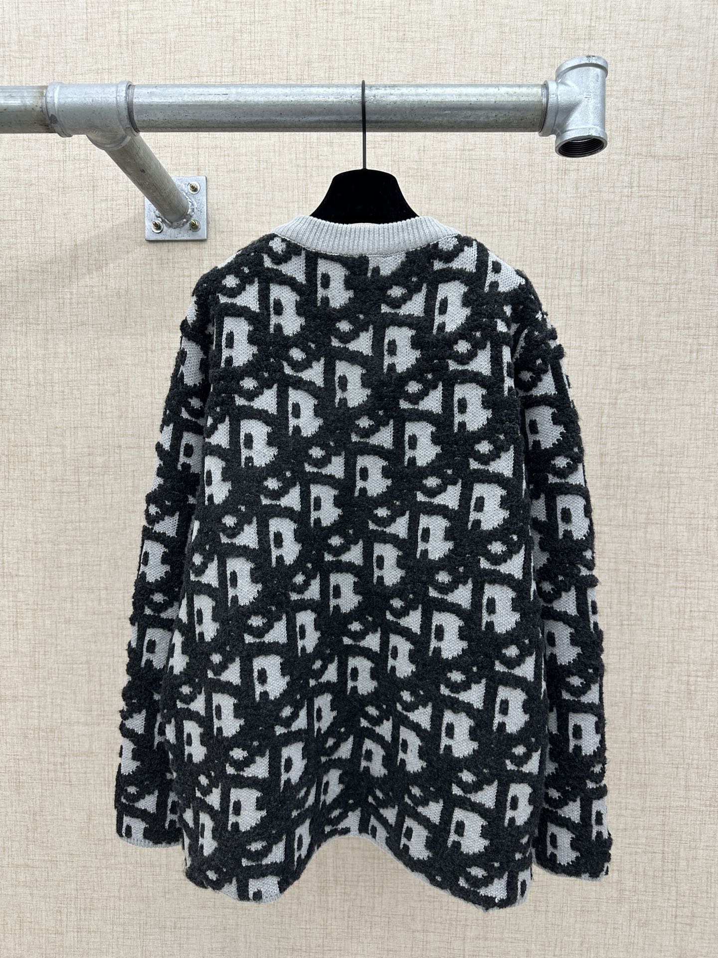 Back view of jacquard knit cardigan with Dior logo pattern, full zip, dark and white