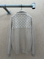 Beige hoodie back with white monogram band and hood