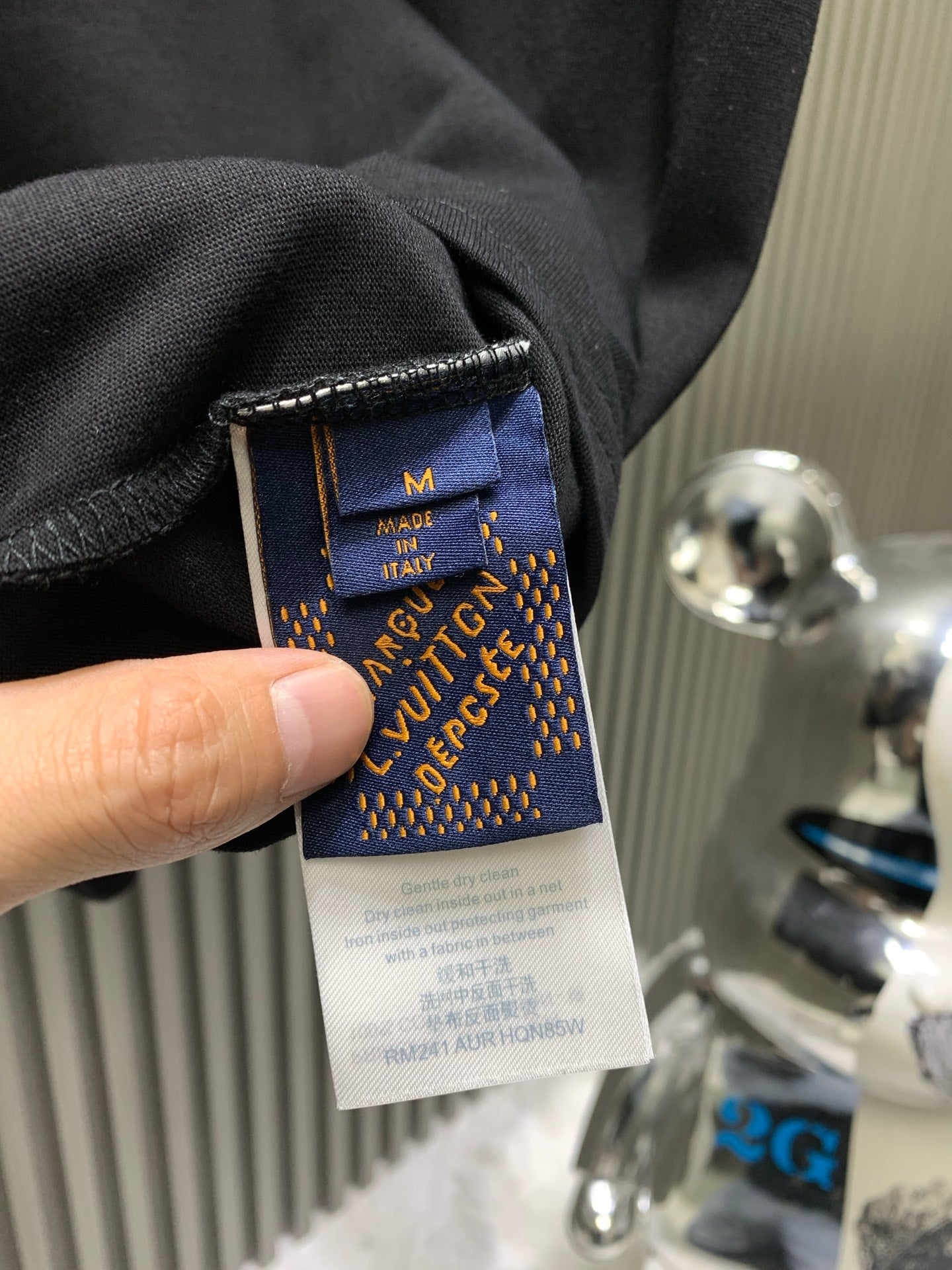 Louis Vuitton black shorts with woven size and brand label