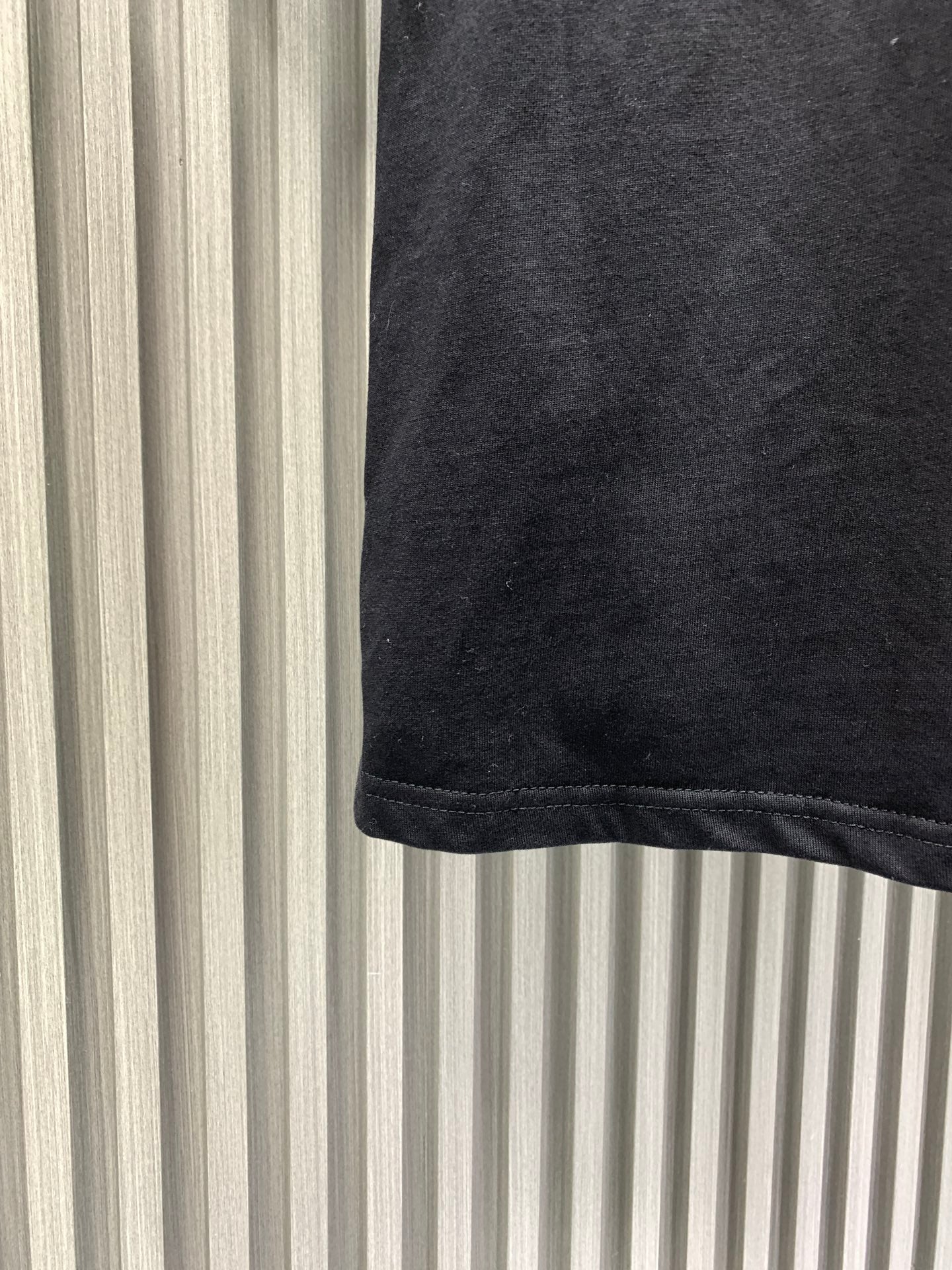 Louis Vuitton black T-shirt hem with stitched edge