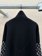Black jacket back with high collar and logo-print sleeve panels