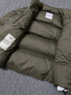 Long puffer jacket open interior with quilted baffles and size label