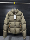 Moncler long puffer jacket in olive with front zip and high collar