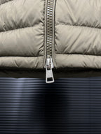 Olive puffer jacket front zipper and metal pull